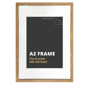 A2 oak wood effect picture frame with a white mat board