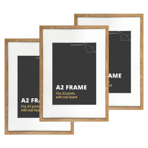Set of three A2 picture frames with American oak-effect borders and white mat boards