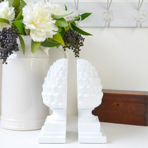 Set 2 White Finial Bookends, a decorative support designed to keep books upright and organised