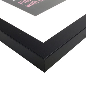 Close-up of the black frame corner and white mat-board detail