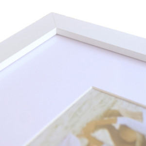 Close-up of a white A4 picture frame showing its simple border and mat board