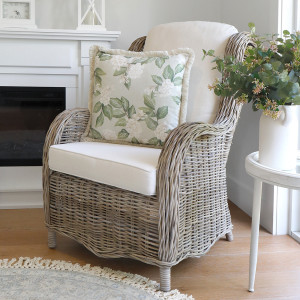 Albany rattan armchair styled with an additional cushion
