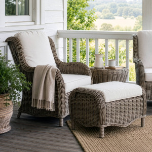 Albany footstool paired with its matching rattan armchair on a verandah