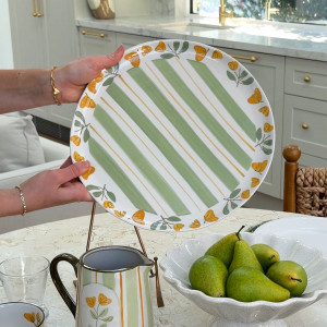 Round Amelia Green Floral Serving Platter, a tabletop piece suited to serving food or creating a decorative display