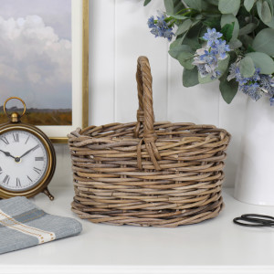 Carson Oval Carry Basket - Small, designed as a versatile storage accent for an interior space