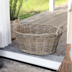 Cooper Washing Basket Antique Grey Cane, designed as a versatile storage accent for an interior space