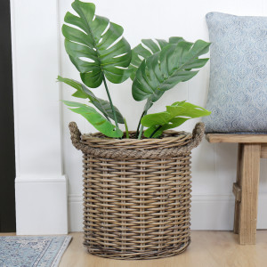 Stonefields Round Rattan Basket - Small, designed as a versatile storage accent for an interior space