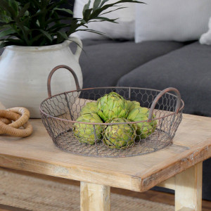 Medium Grange Wire Basket with Handles, designed as a versatile storage accent for an interior space