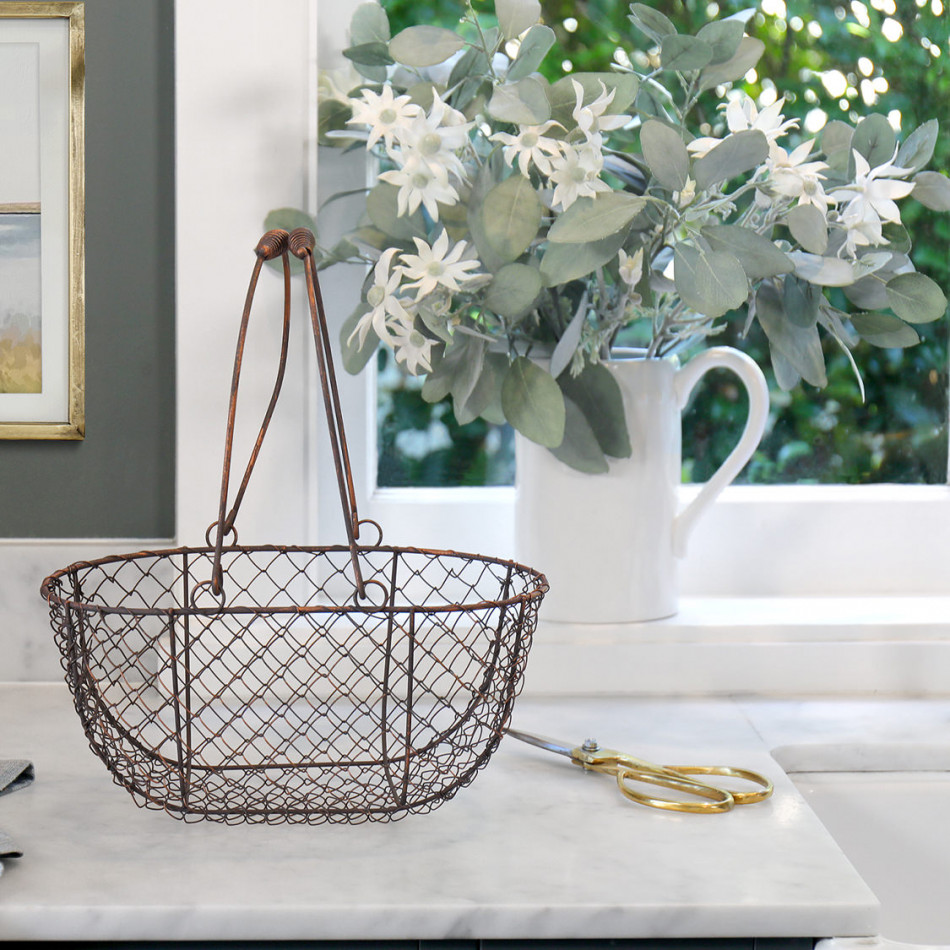 Small Wickford Wire Basket, designed as a versatile storage accent for an interior space
