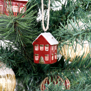 Holly Lane red house bauble showing front and side windows, a green tree detail and its hanging loop