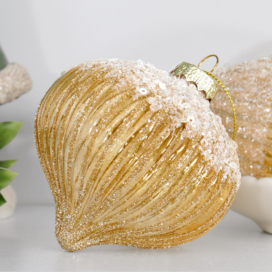 Close-up of the gold glitter ribs and sparkling decorative top on a Francesca onion bauble