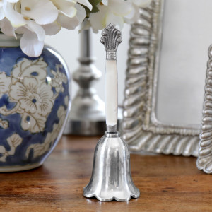 Fleur Silver Bell with Bone Handle, highlighting the product's distinctive form and defining design