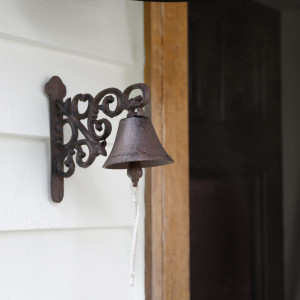 Wilton Vintage Wall Bell Scroll Detail - Cast Iron Doorbell, highlighting the product's distinctive form and defining design