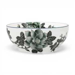 Round white ceramic bowl with raised black and grey camellia flowers on a white background