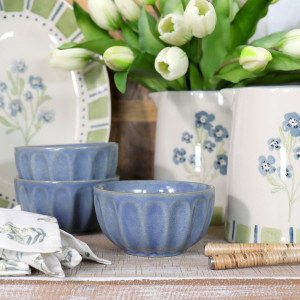 Denim Blue Fluted Bowl, a tabletop piece suited to serving food or creating a decorative display