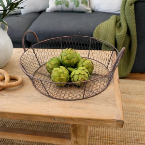 Large Grange Wire Basket with Handles, designed as a versatile storage accent for an interior space
