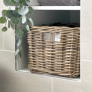 Brook Rattan Storage Basket Antique Grey, designed as a versatile storage accent for an interior space