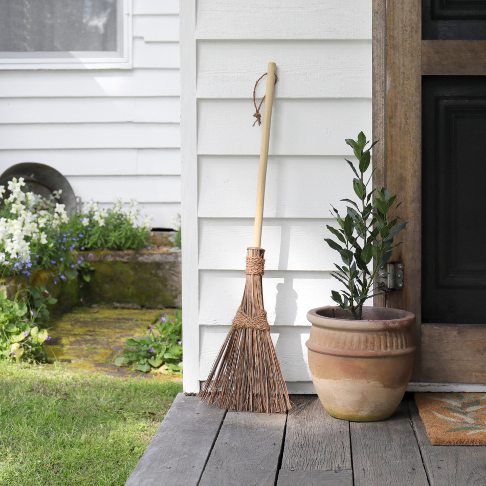 Ivy Lane Compact Traditional Straw Broom, a practical household cleaning accessory