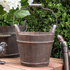 Small reclaimed fir wood barrel bucket with dark metal bands and carry handle