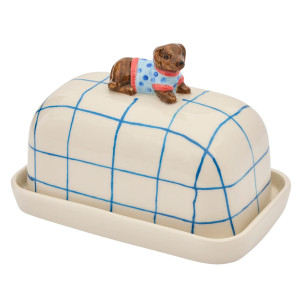 Angled front view showing the dachshund topper and rectangular porcelain base