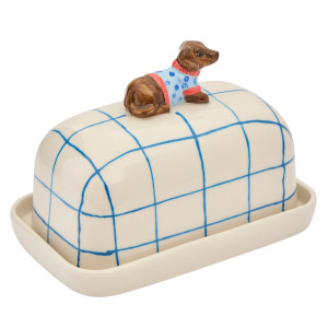 Side view of the checked porcelain butter dish with brown dachshund handle