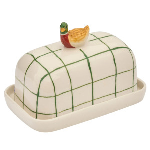Side view of the checked porcelain butter dish with sculpted mallard duck handle
