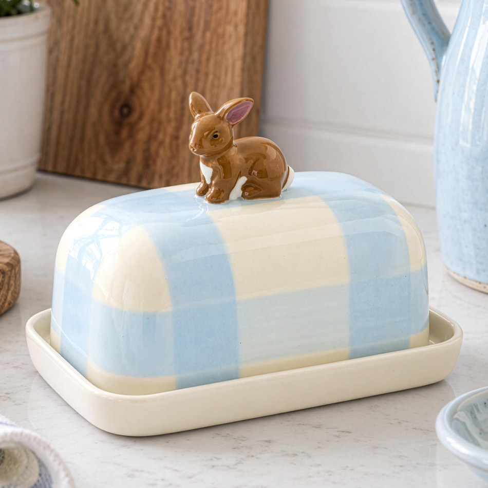 Rosie Rabbit porcelain butter dish with pale blue check lid styled on a kitchen bench