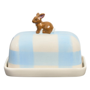 Front view of pale blue checked butter dish with hand-painted brown rabbit topper