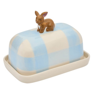 Front angled view of blue checked butter dish with brown rabbit lid handle