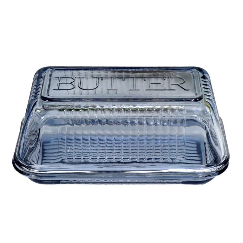 Front view of the soft blue glass butter dish with ribbed sides and raised BUTTER lettering