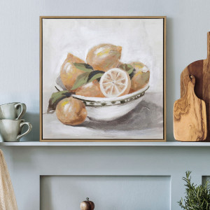 Cordoba still life canvas showing whole lemons, a sliced lemon and leafy stems in a bowl