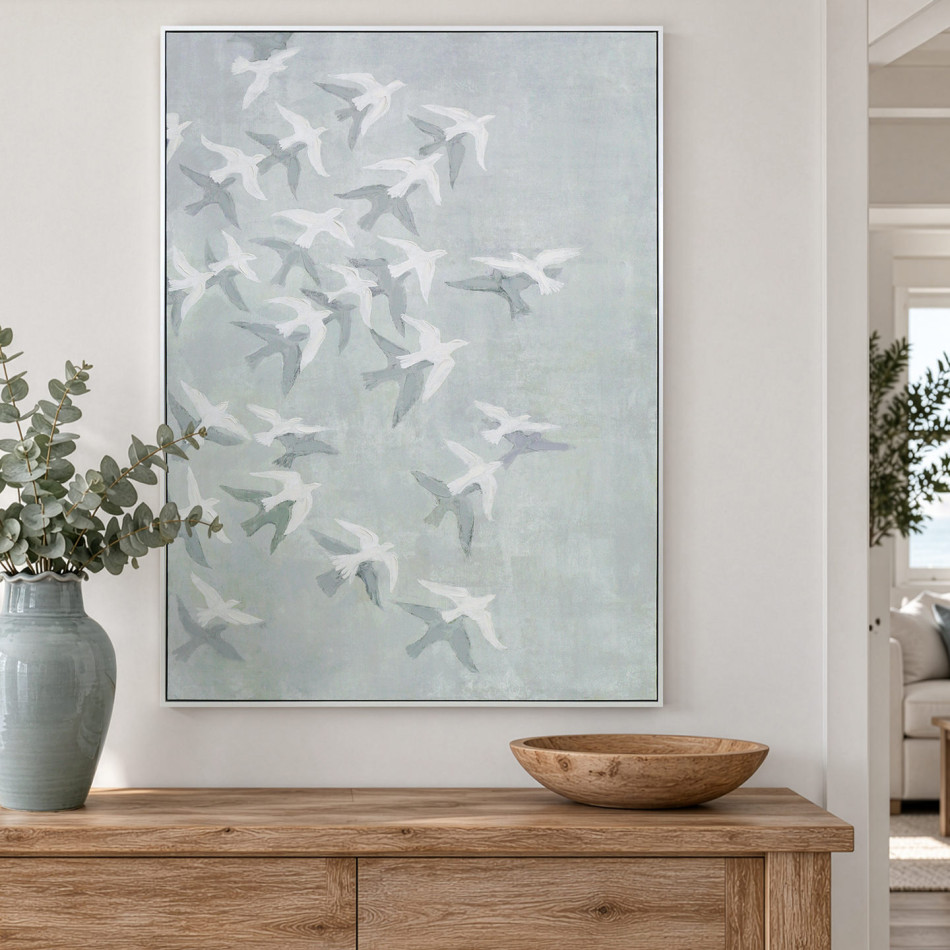 Skyward white bird canvas above a timber sideboard with a eucalyptus vase and wooden bowl