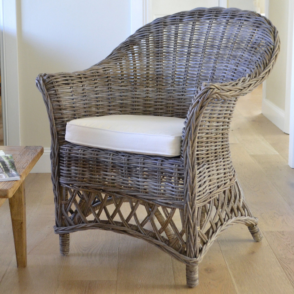 Antique-grey Charlotte rattan armchair with curved back, lattice base and cream seat cushion