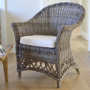 Antique-grey Charlotte rattan armchair with curved back, lattice base and cream seat cushion
