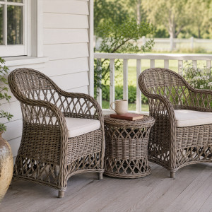 Clifton side table with mug and books between two rattan chairs on a verandah
