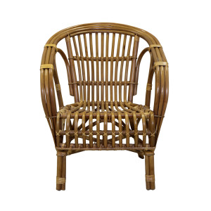 Front view of the Avery armchair showing its open cane back and looped arms