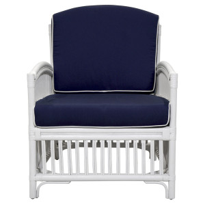 Front view of the white rattan armchair with navy seat and back cushions