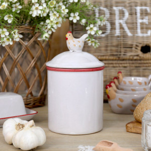 The Little Red Hen Canister, highlighting the product's distinctive form and defining design