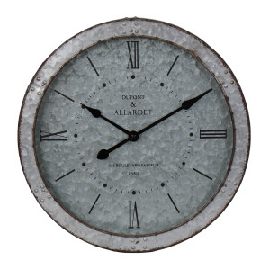 Front view of textured silver wall clock with black hands, Roman numerals and French lettering