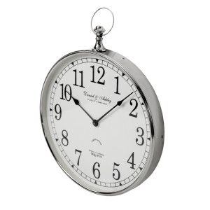 Angled view showing the polished metal frame and depth of the Stanford clock