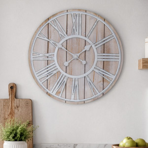 Manningtree wall clock displayed with timber boards, greenery and green apples