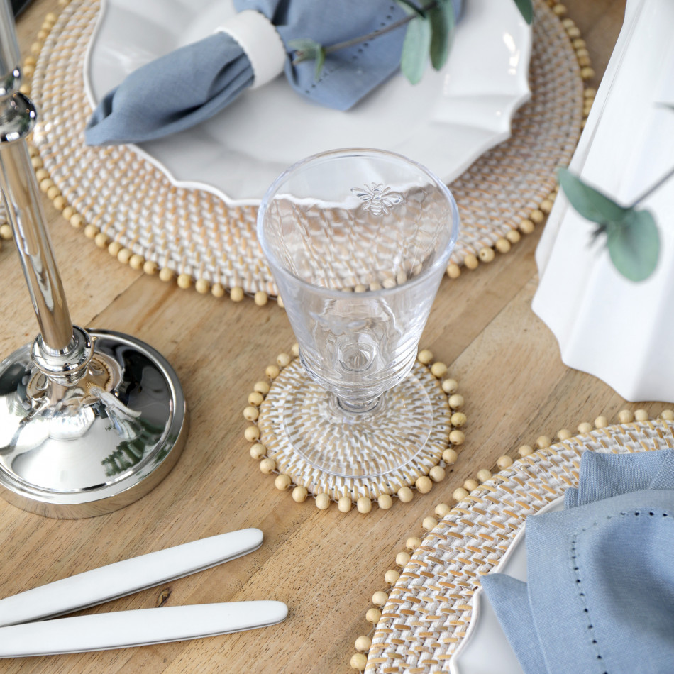 Set 4 Avoca Whitewash Rattan Coasters, a tabletop accessory for protecting surfaces