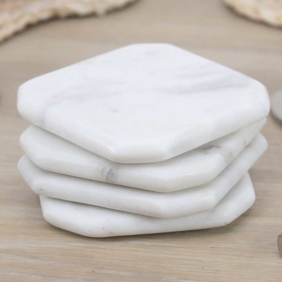 Set 4 Melita White Marble Coasters, a tabletop accessory for protecting surfaces