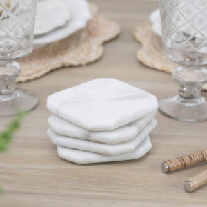 Set 4 Melita White Marble Coasters, a practical surface protector with decorative dining appeal