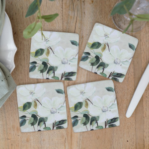 Set 4 Calista White Magnolias Coasters, a tabletop accessory designed to protect surfaces from drinkware