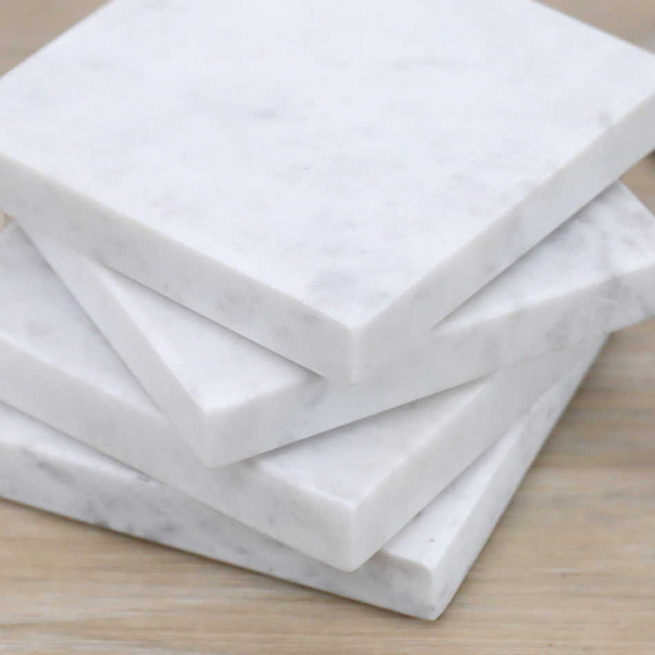 Set 4 Jamila Square White Marble Coasters, a tabletop accessory for protecting surfaces