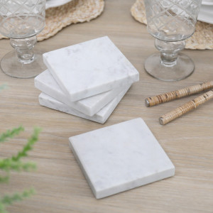 Set 4 Jamila Square White Marble Coasters, a tabletop accessory designed to protect surfaces from drinkware