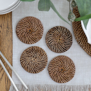 Set 4 Newport Brown Rattan Coasters, a practical surface protector with decorative dining appeal