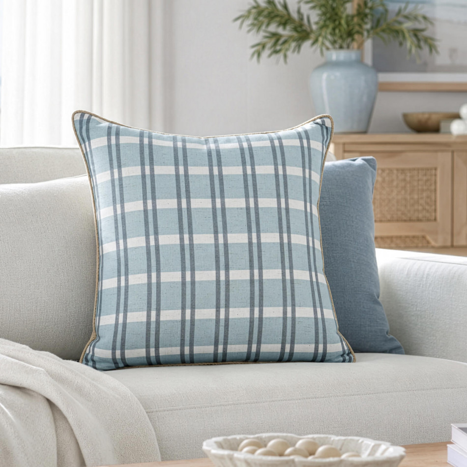 Clovelly Blue Check Cushion, shown as a soft decorative accent for layering on seating or a bed