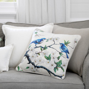 Eliza Blossom Blue Wrens Cushion, shown as a soft decorative accent for layering on seating or a bed